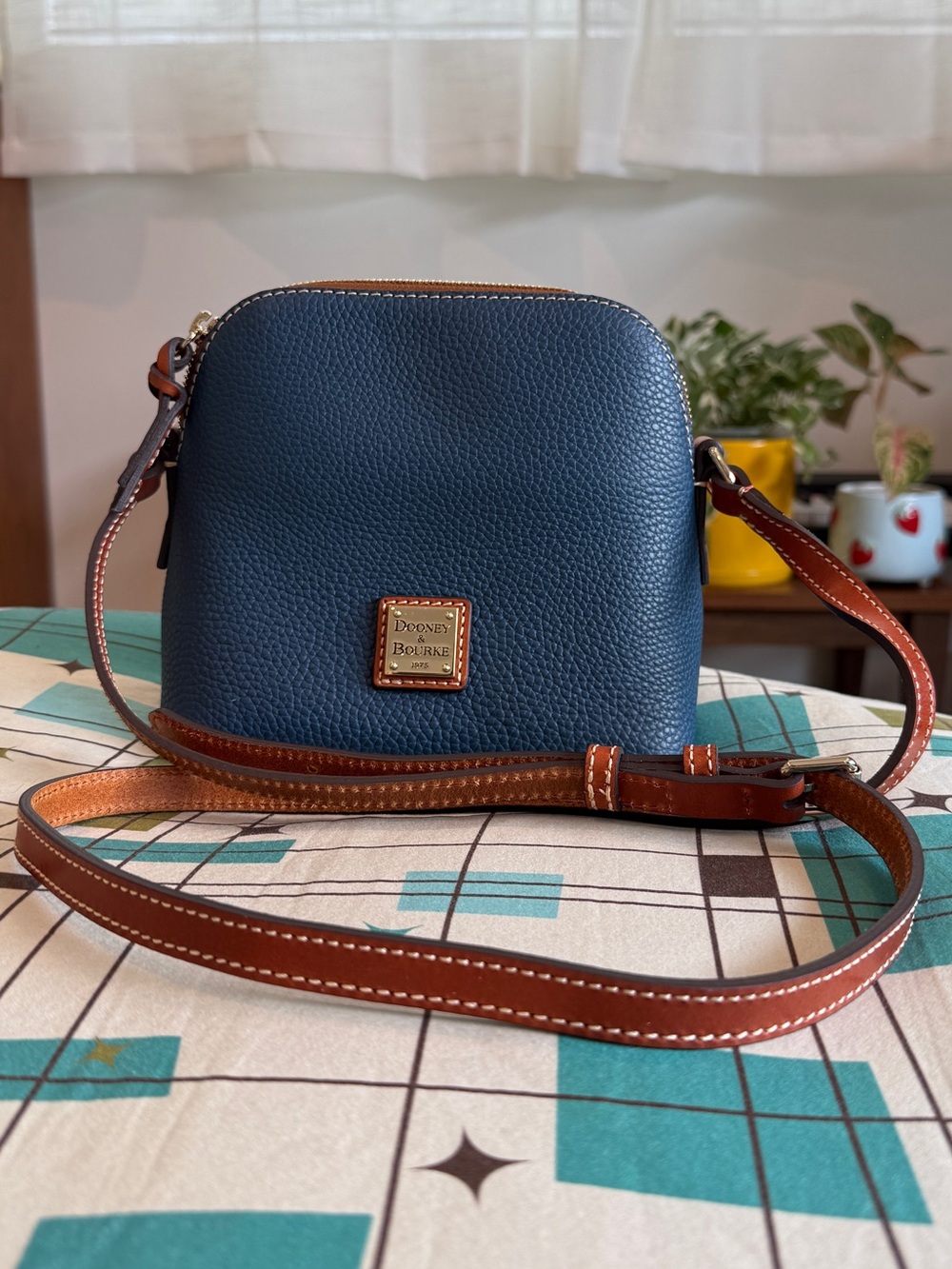 Dooney & Bourke Navy Pebble Leather Crossbody with Brown Trim and Gold Hardware